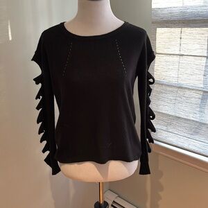 Black sweater arm detail